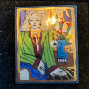 Laura Mostaghel - woman in green